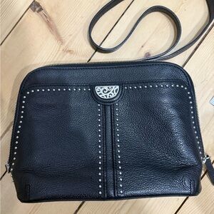 Brighton Jojo Domed Organizer crossbody in black leather with silver studs.